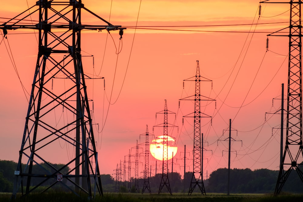 Power grid with a sunset background