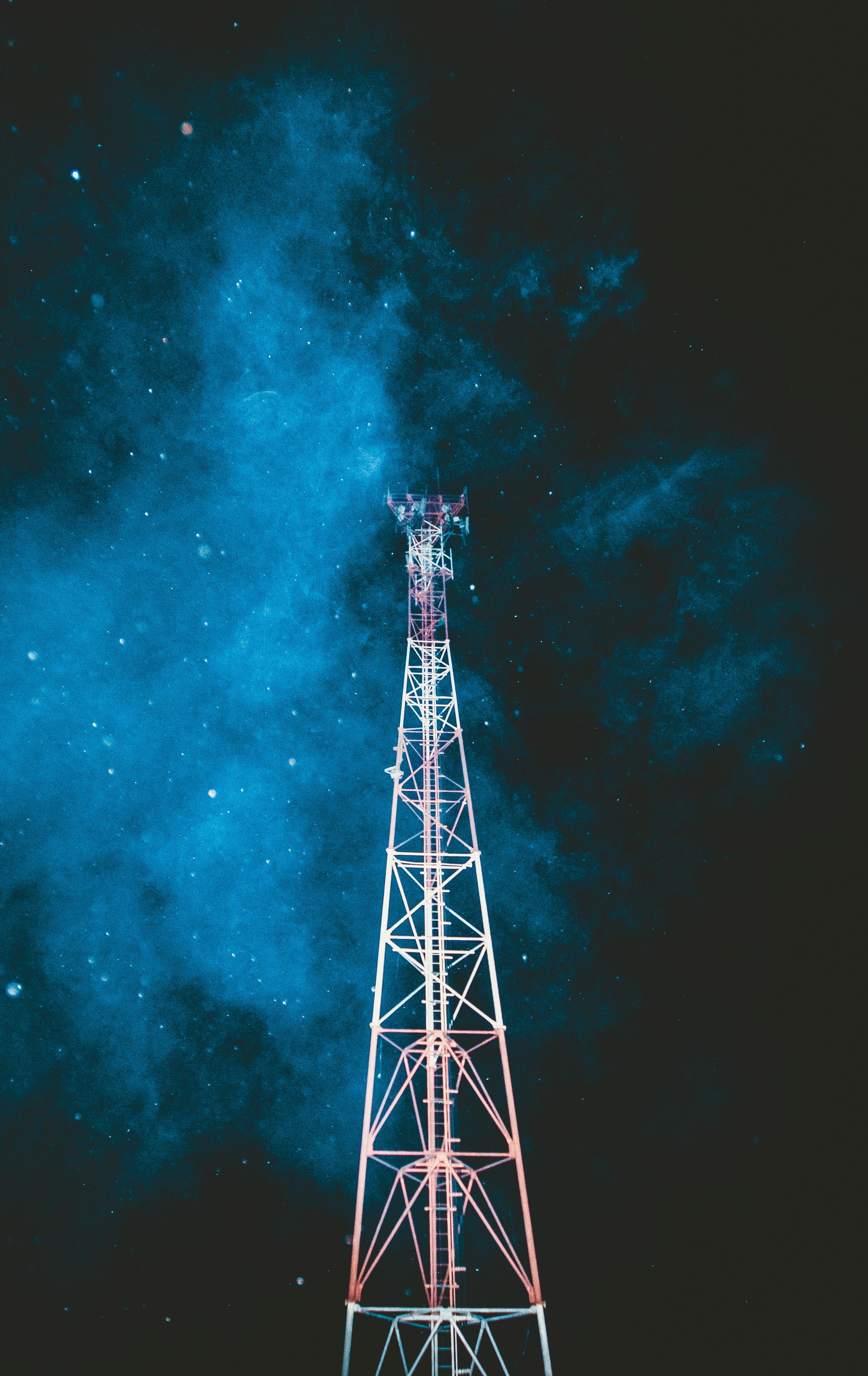 Telecom tower with a blue sky background